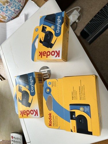 Three disposable cameras - ,
